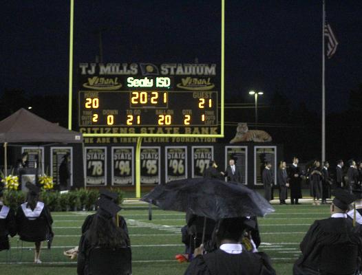 Sealy High School’s Class of 2021 graduated through the rain and ahead of a severe thunderstorm last Friday, May 28, on Mark A. Chapman Field at T.J. Mills Stadium. COLE McNANNA