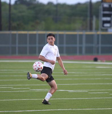 Tiger senior Ricky Avila reaches back to make a play on the ball and keep it advancing into the Splendora end during Sealy’s regional semifinal playoff game at Cy Park High School last Tuesday. (Cole McNanna/Sealy News)