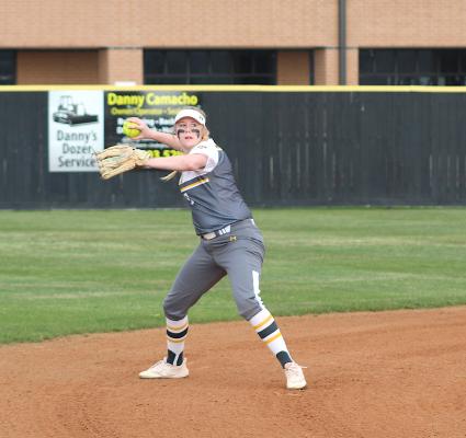 Lady Tiger senior Justice Jett prepares a throw to third base during Sealy’s home district finale against Navasota last Friday. (Cole McNanna/Sealy News)