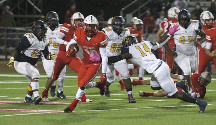 Bellville junior running back Richard Reese breaks through a would-be tackler during the Brahmas’ home district game against La Marque at the Pasture of Pain Oct. 30, 2020. Reese recently committed to Baylor after his high school career comes to a close. COLE McNANNA