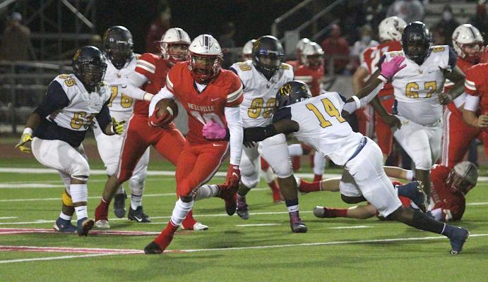 Bellville junior running back Richard Reese breaks through a would-be tackler during the Brahmas’ home district game against La Marque at the Pasture of Pain Oct. 30, 2020. Reese recently committed to Baylor after his high school career comes to a close. COLE McNANNA
