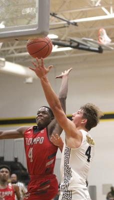 El Campo's Rueben Owens and Connor Krenek battle at the rim
