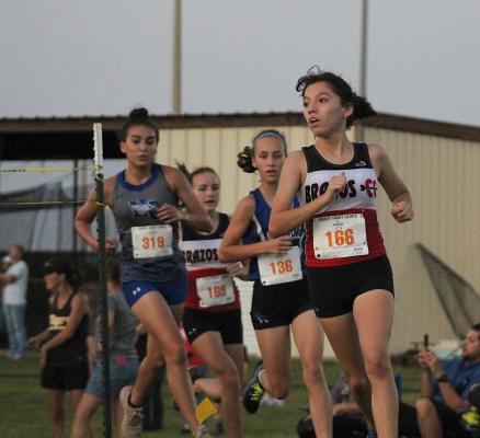 Brazos junior Esmeralda Garcia makes a turn during the Frio Friday Night Lights meet at Sealy High School last Friday. COLE MCNANNA