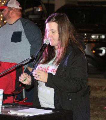 Sealy Community Foundation President Melanie Willingham makes an announcement following last year’s Fantasy of Lights parade Dec. 5, 2020. This weekend kicks off the 35th annual winter celebration. 