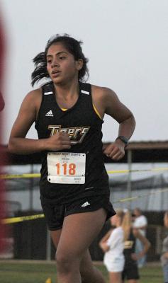 Lady Tiger senior Hailey Arteaga opened her season with the Frio Friday Night Lights meet at Sealy High School last Friday. COLE McNANNA