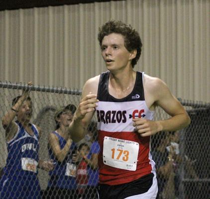 Cougar junior Bryan Pedroza eyes the finish line at Sealy’s Frio Friday Night Lights meet Aug. 20.