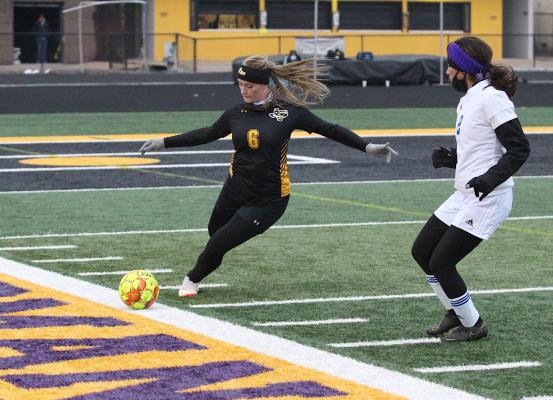 Sealy junior Kenna Killough looks to clear a ball from the defensive end during the Lady Tigers’ district contest on Feb. 12 at T.J. Mills Stadium. Killough was named the District 20 Defensive MVP for her efforts. (Cole McNanna/Sealy News)
