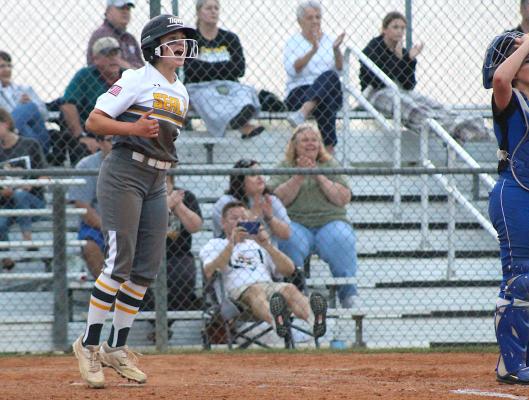 Sealy senior Brooke Kram celebrates a run scored during the Lady Tigers’ five-run third inning that helped earn a 7-2 win over Navasota in the regular-season home finale last Friday. (Cole McNanna/Sealy News)