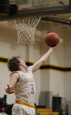 Tiger sophomore Reid Miller secures a defensive rebound in the second half of the District 24-4A contest against El Campo at Sealy High School last Friday. COLE MCNANNA