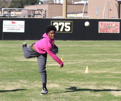 Sealy junior DeMarques Thompson fires a throw during the Tigers’ first practice of the season last Friday at the Mutt. COLE McNANNA