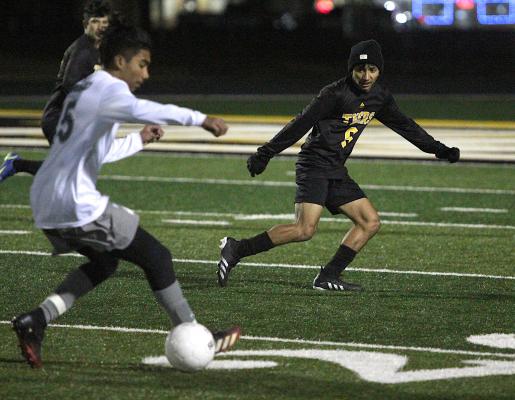 Tiger sophomore Maximo Requema tracks a Hempstead ball carrier in the first half of Sealy’s district-opening match against the Bobcats on Mark A. Chapman Field at T.J. Mills Stadium Jan. 21. COLE McNANNA