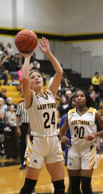 Lady Tiger sophomore Blair Kram hits a layup in the second half of Sealy’s home district game against Navasota last Friday, Jan. 21. COLE McNANNA