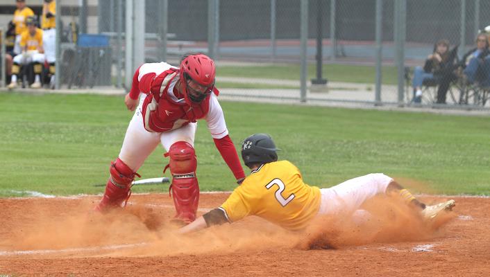 Logan Stilts is tagged out at a play at the plate in the third inning of Sealy’s district contest against Royal on the road Monday. (Cole McNanna/Sealy News)