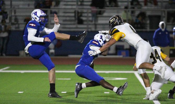 Sealy senior Connor Krenek secures a blocked punt in the first quarter of the Tigers’ district game against Wharton at Eddie Joseph Memorial Stadium Oct. 29, 2021. Krenek was an honorable mention utility player on the TSWA All-State team. COLE McNANNA