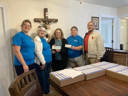 Pictured left to right: Eileen Parks, Adela Wadephul, Sally Reyes, Joleen Phillips and J.D. Reyes for St Vincent de Paul Society.
