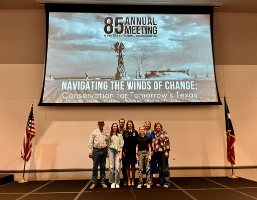 From left are Kenneth Blezinger, Emma Krenek, Casey Krenek, Kaitlyn Krenek, Wyatt Krenek,Andrea Krenek and Charisse Blezinger. Kaitlyn Krenek was the 1st Place winner for her FFA Speech and was honored at the 85th Annual Meeting of the Texas Soil &amp; Water Conservation Districts.
