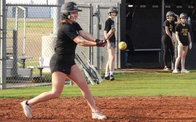 Sealy junior Taylor Cash connects with a pitch during an intrasquad scrimmage on Jan. 22 at the high school. (Cole McNanna/Sealy News)