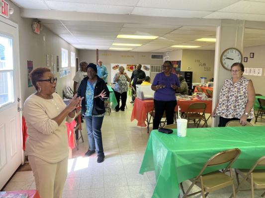 Elderly residents enjoy an afternoon out together at the Seniors’ Day Out Program, dancing to the hokey pokey, playing games and sharing a home cooked southern meal. PHOTO BY ABENEZER YONAS