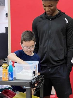 Pictured left to right, BISD elementary student Oliver Andrews and high school student Khaymon Jones at OBI school campus. Students participated in a “Think Your Drink” exercise which was conducted during the fourth week educational program at all BISD elementary school campuses. COURTESY PHOTO