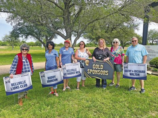 Members of the Raising Academic Performance, Inc. Board pose for pictures at a recent fund-raising event. COURTESY PHOTOS