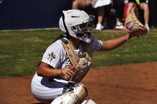 Nathaly Velazquez snags a pitch from Alivia Ramon. COURTESY PHOTO