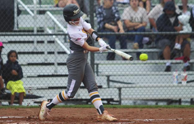 Lady Tiger freshman Colette Kelley finished with five RBIs, four hits and a run scored to help Sealy take down Wheatley 24-2 in the bi-district round of the playoffs last Thursday at home. PHOTOS BY COLE McNANNA
