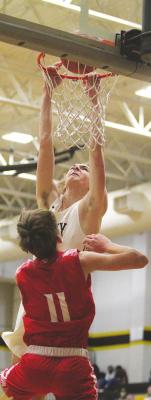 Sealy senior Jacob Gajewski earned first-team all-district honors for his 2020-2021 season as voted on by the other District 24-4A coaches. Pictured is Gajewski finishing a dunk during a non-district home game against Columbus Dec. 8, 2020. (Cole McNanna/Sealy News)