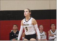 Lila Meyer watches the ball before making a play at the net during a game against the Edna Cowgirls on Thursday, Aug. 14, 2025, at Columbus High School. SEALY NEWS | EVAN HALE