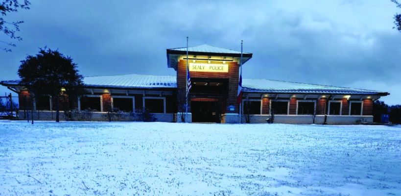 During this past year’s snowstorm to blanket the area with a layer of snow, the Sealy Police Station also received its fair of snow as well. COURTESY PHOTO
