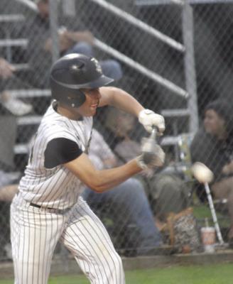 Weston Cryan lays down a bunt before sprinting to first base. SEALY NEWS | EVAN HALE