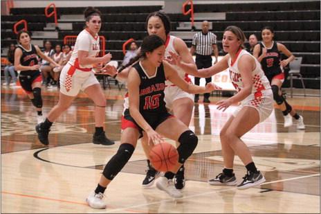May Mendez drives against Van Vleck earlier this year. PHOTOS BY JIMMY GALVAN