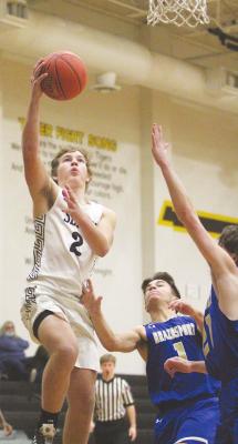 Tiger junior Callen Rabius elevates for a layup in last Saturday’s nondistrict win over Brazosport Christian at Sealy High School. Cole McNanna
