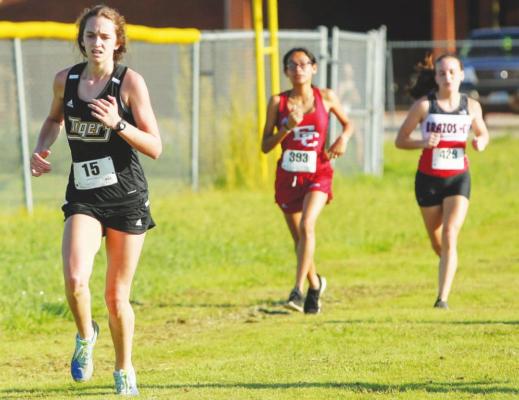 Lady Tiger sophomore Annabelle Williams competes in the 15th annual Brazos Invitational last Saturday in Wallis. Williams was Sealy’s top finisher and helped take second in the team competition. RYAN DUNSMORE/FORT BEND HERALD