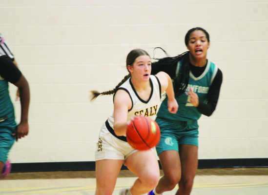 Kara Kram sprints down the court in a fast break opportunity. PHOTOS BY SEALY NEWS | EVAN HALE