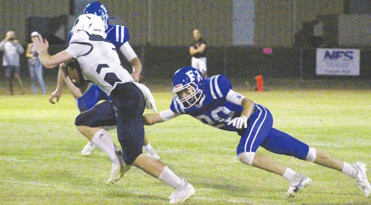 Faith Academy senior Maury Cano lunges for a tackle during the Knights’ non-district contest against Northside Sept. 10 at SAB Stadium. Cano led the defensive unit with eight tackles in its 60-12 win over Brazosport Christian last Friday on the road. COLE McNANNA