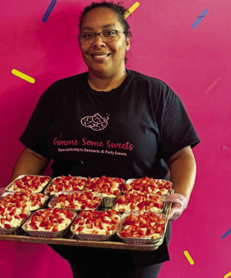 Gimme Some Sweets owner Tasha Jackson with a freshly made batch of desserts.