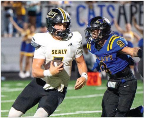 Sealy junior Kane Killough looks for running room during last Friday’s OT loss to Bay City. Sealy dropped the contest 35-34 to move to 3-1 on the season. Sealy will host Needville this Friday at 7 p.m.