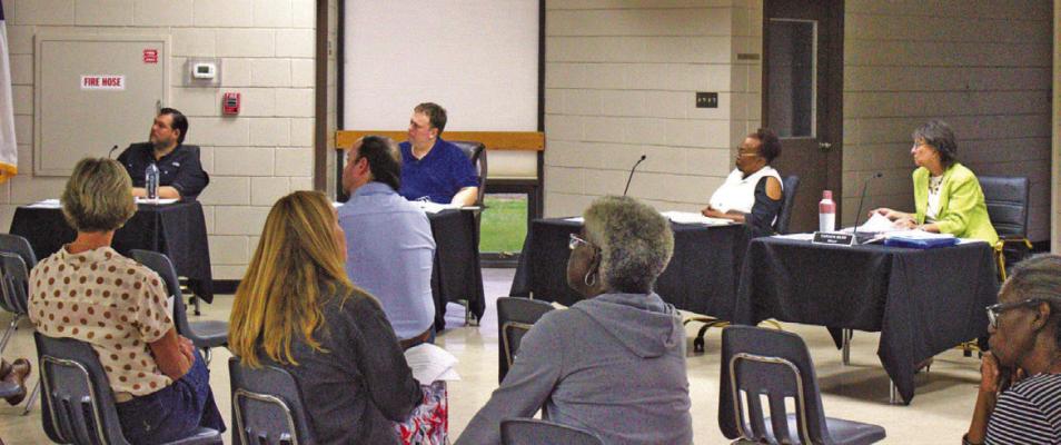 Council members discussing agenda items. CONTRIBUTED PHOTO