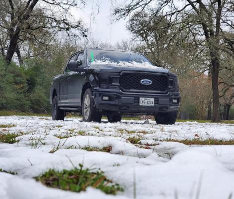 Sealy resident Chris Rincon took his truck up to the northern end of the county and took advantage of the snow backdrop.