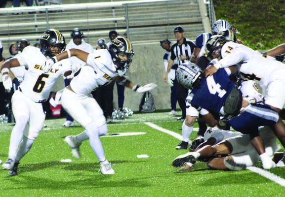 It took a team effort to keep West Orange-Stark running back Kelby Jefferson, 4, in check. Here Isaiah Dukes-Self, 34, Elijah Sanders, 2, Jadon Hernandez, 16, are able to take him down. Coming up to help are Javien Grant, 6, and AJ Cepon, 1. Jefferson rushed for 126 yards and scored a pair of touchdowns for the Mustangs.