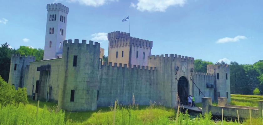 TOP: Newman’s castle in Bellville is Michael Newman’s private residence, but he gives tours of the home he built six days per week. The castle is complete with a moat and working drawbridge.
