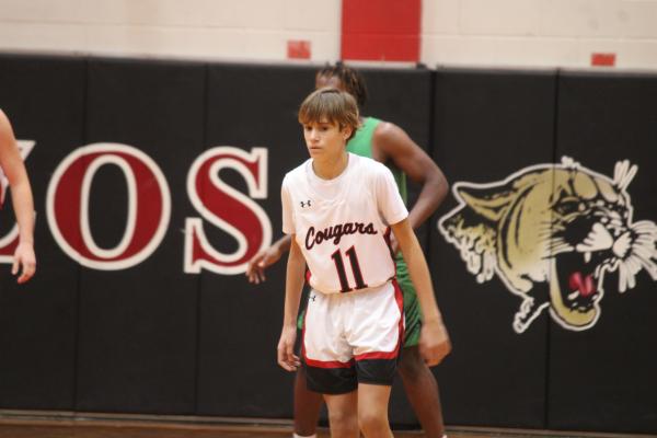 SEALY NEWS | EVAN HALE JY Miles keeps a close eye on the ball while playing defense.