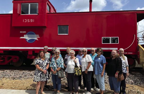 Pictured left to right, back row, Joan Buenger, Shirley Beum, Knellen Quinteros, Barney Zimmerman, Fred Zimmerman, and Pat Allee. Front row, left to right, Rosenberg Railroad Museum Tour Guide, Judy Schulz, Linda Behrens, Veronica Ashorn, Jo Ann Reichle, and Jessie Kokemor. COURTESY PHOTO