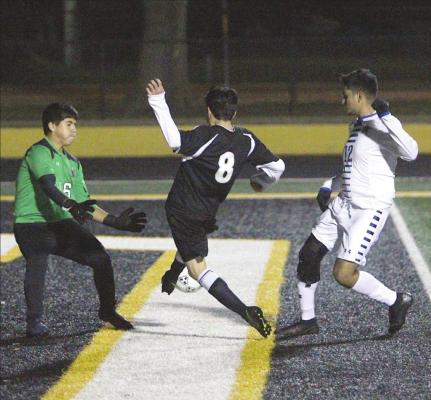 Sealy’s Carlos Reyes (8) puts a shot on net during the Tigers’ district contest against Navasota last Friday on Mark A. Chapman Field at T.J. Mills Stadium in Sealy. Reyes supplied the game-winning goal to help the Tigers improve to 5-0 in district play. (Cole McNanna/Sealy News)
