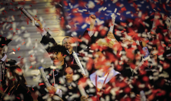 Dustin Holub and other students celebrate their graduation during the Brazos High School graduation ceremony, May 15, at Cougar Stadium. PHOTO COURTESY RONIN VISUALS