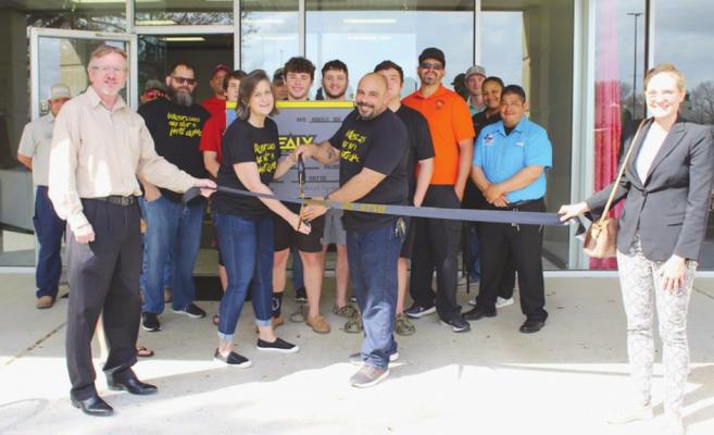 Sealy Jiu Jitsu owners Dona and Kenneth Amador were joined by family and friends at their ribbon cutting event last Friday at 3701 Outlet Center Drive, Suite 240, Sealy TX. (Cole McNanna/Sealy News)
