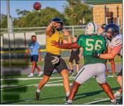 Kane Killough unloads a pass during a scrimmage against Taylor. COURTESY PHOTO
