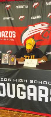 Cougar defensive lineman D.J. Lewis signed his National Letter of Intent to play football at Texas Lutheran University next season at a ceremony at Brazos High School on Jan. 8.