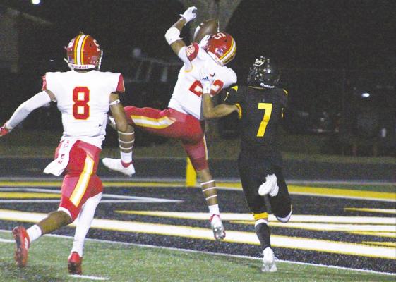 Stafford sophomore defensive back Briytan Buckner secures one of four interceptions the Spartan defense came down with during Friday’s non-district game against Sealy at T.J. Mills Stadium. COLE McNANNA