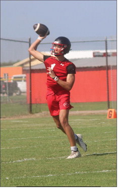 Colton Hudgins throws a screen pass to his receiver during the Wallis Brazos Cougars first practice of the year at Brazos High School on Monday, Aug. 3. SEALY NEWS | EVAN HALE